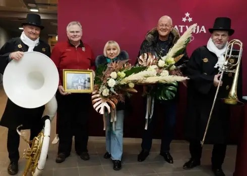 Olimpiešus sagaida lidostā